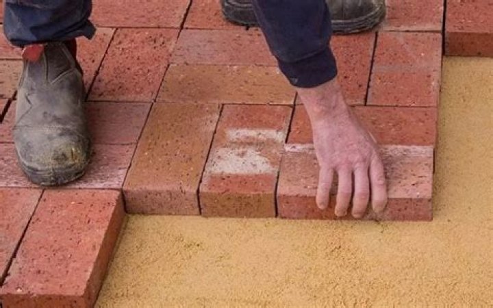 Can you lay pavers on just sand?